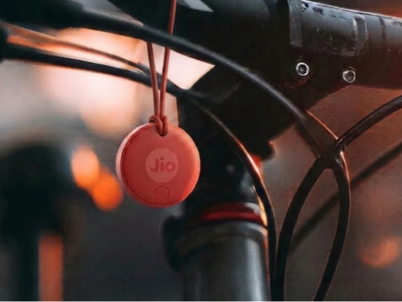 A Red JioTag hanging from a bicycle